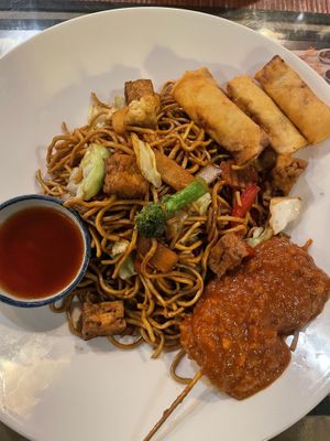 Nr.17. Fried noodles with tofu, Fried spring rolls and a Chick*n skewer in peanut sauce. Really good!  at Usagi in Gothenburg