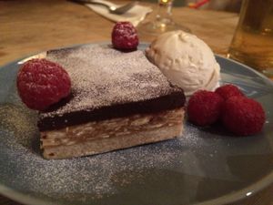 Millionaire shortbread with coconut, almonds served with a side of salted caramel and vanilla ice cream.  Our favorite of the night. at Earth and Stars in Brighton