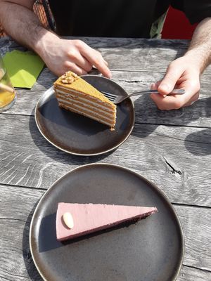 Honey cake and raw cherry cake at Vegan's Prague in Prague