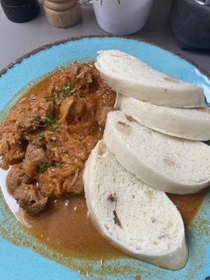 Goulash with dumplings  at Vegan's Prague in Prague