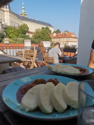 vegan goulash and the small balcony at Vegan's Prague in Prague
