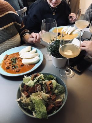 Goulash and Caesar salad with tempeh 😍 at Vegan's Prague in Prague