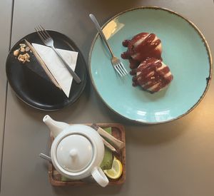 Raw snickers cake, strawberry dumplings & fresh ginger tea  at Vegan's Prague in Prague