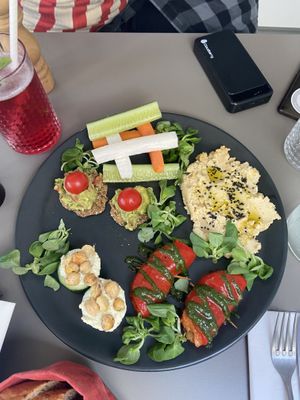 Appetizer mix-plate, raspberry lemonade  at Vegan's Prague in Prague