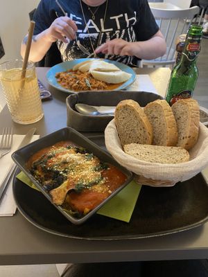 Lasagne with homemade bread and goulash with dumplings.  at Vegan's Prague in Prague