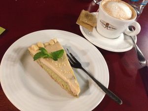 A divine lemon cake and a soy cappucino at Vegan's Prague in Prague