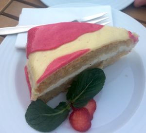 Raw apricot cake and marizpan 'Happy Cow' cake. This restaurant has exceptional desserts! at Vegan's Prague in Prague