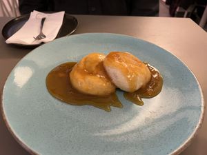 Apricot dumplings: warm, nice texture, delicious dessert   at Vegan's Prague in Prague