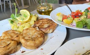 Soy schnitzel done to perfection with yummy potatoes  at Vegan's Prague in Prague