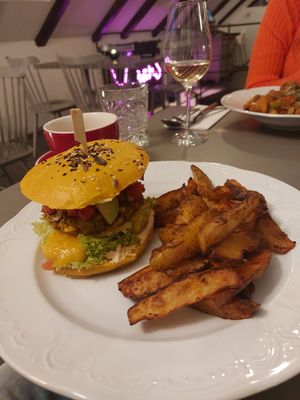 Special burger, mango, jalapeños, and great potato wedges at Vegan's Prague in Prague