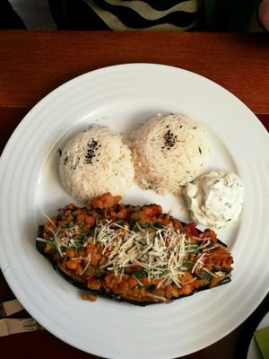 menu of the day: eggplant fuelled with chickpeas and vegetables with rice at Vegan's Prague in Prague