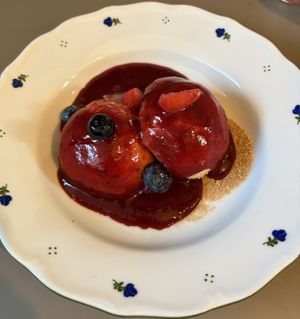 plum jam dumpling with fruit and cinnamon crumbs!  at Vegan's Prague in Prague