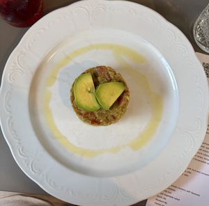 tomato tartare with avocado, toasted bread, garlic oil!  at Vegan's Prague in Prague