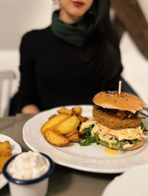 vegan burger with fries at Vegan's Prague in Prague