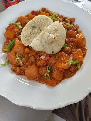 Vegetable goulash with traditional dumpling at Vegan's Prague in Prague