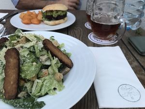 Caesar Salad and Warhol Burger at Vegan's Prague in Prague