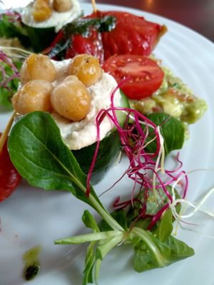 cucumber filled with hummus on the starter plate at Vegan's Prague in Prague