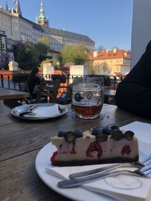 Raw cake withe a view from the roof terrace at Vegan's Prague in Prague