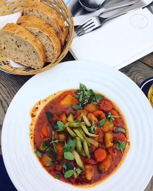 Vegan goulash with fresh baked bread  at Vegan's Prague in Prague