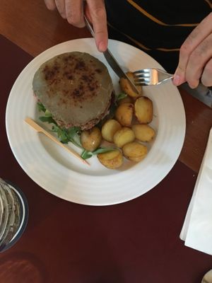 Tofu & seitan Burger & potatoes at Vegan's Prague in Prague