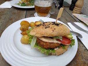 Burger with potatoes !!  at Vegan's Prague in Prague