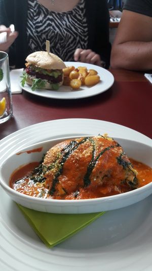 Zucchini lasagne and Warhol Burger at Vegan's Prague in Prague