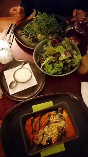 Lasagna, salad and I actually forgot what’s underneath the salad on the far plate, but it was good 😋😋😋 at Vegan's Prague in Prague