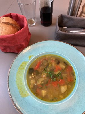 Soup with housebaked bread  at Vegan's Prague in Prague