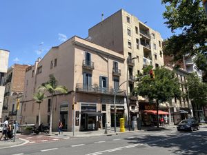 The bakery is in the pink building. at Crois-Sants in Barcelona