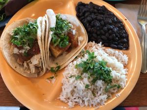 Tofu taco and mock chicken taco with black beans and cilantro rice. at Bumble Bees Baja Grill in Santa Fe