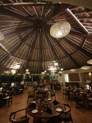 Open restaurant cooled with ceiling fans by the sea at Salvia in Playa Del Carmen