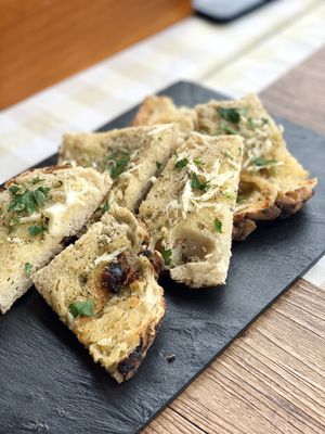 Bolo do Caco with vegan butter, parsley and garlic at O Forno in Calheta