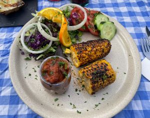 BBQ corn with BBQ beans and a side saladd  at O Forno in Calheta