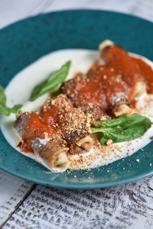 PANCAKES WITH LENTIL PATE WITH TOMATO-BASIL SAUCE at Vegano Hooligano - Mala in Odessa