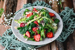 Salad with quinoa, strawberries, avocado and parmesan at Vegano Hooligano - Mala in Odessa