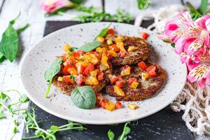 Potato pancakes with sausage and fresh tomatoes at Vegano Hooligano - Mala in Odessa