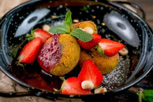 Cottage cheese pancakes with banana and seasonal berry (220) at Vegano Hooligano - Mala in Odessa