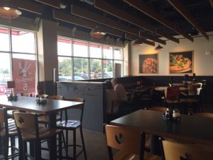 booths tables or bar stools! sit where you want at Pie Five Pizza in Dover