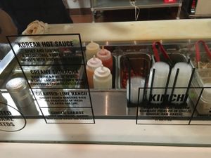 Finishing touches and sauces marked with VF (vegan friendly) at SeoulSpice in Washington