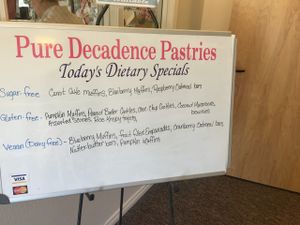Sign and entry at Pure Decadence Pastries  in Salem