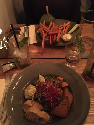 Soul burger with sweet potato fries and a salat with edamame, hummus, tofu, pesto and quinoa! at Souls in Copenhagen