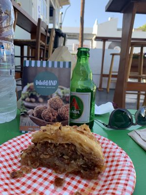 their baklava is thic! and enjoyed them while drinking the greek beer! at FalafeLand in Santorini