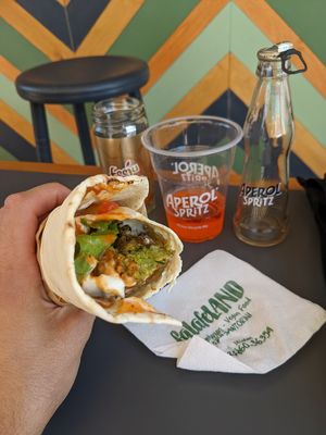 Volcano with added vegan mayo, aperol spritz, bio iced tea at FalafeLand in Santorini