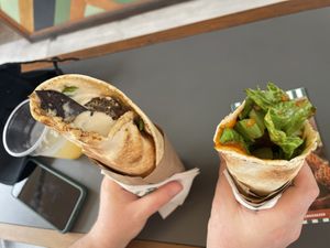 Giant original and small volcano at FalafeLand in Santorini