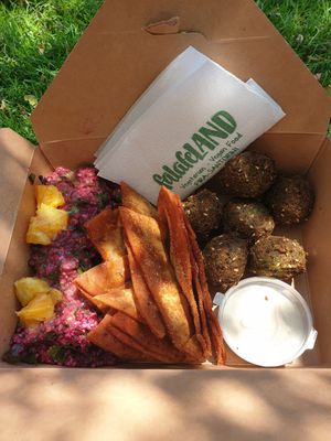 The best falafel box:) beetroot tabbouleh, Arabic pita chips..soo delicious 🧡 at FalafeLand in Santorini