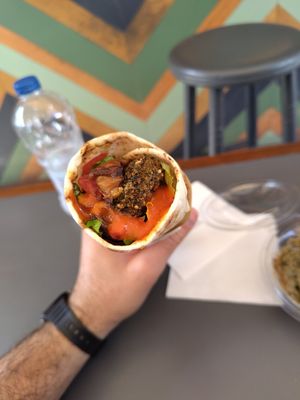 Special Wrap with sweet and sour sauce, incredible 😋 at FalafeLand in Santorini