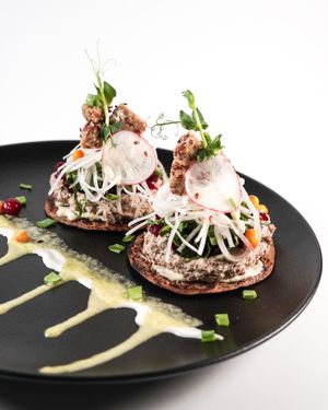 Viking pancakes with grey peas hummus and horseradish cheese. at The Beginnings - Kr.Barona Iela in Riga