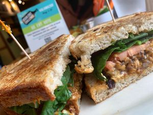 Marauder's Melt: Griddled Sourdough, Tempeh, Spinach, Tomatoes, Sautéed Onions, Vegan Provolone, Thai Sauce w/choice of side (Kalamazoo Vegan Chef Challenge 5/26) at Crow's Nest in Kalamazoo