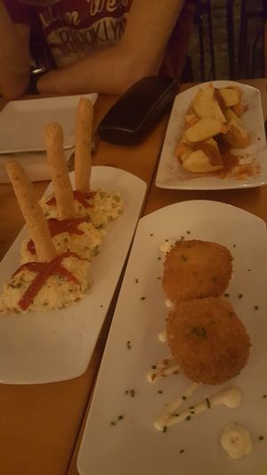 ensaladilla rusa, croquetas, patatas bravas at El Maderal in Barcelona