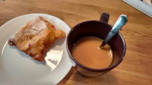 sweet bun & oat milk coffee at Cafe & Bakery Mimosa in Tampere